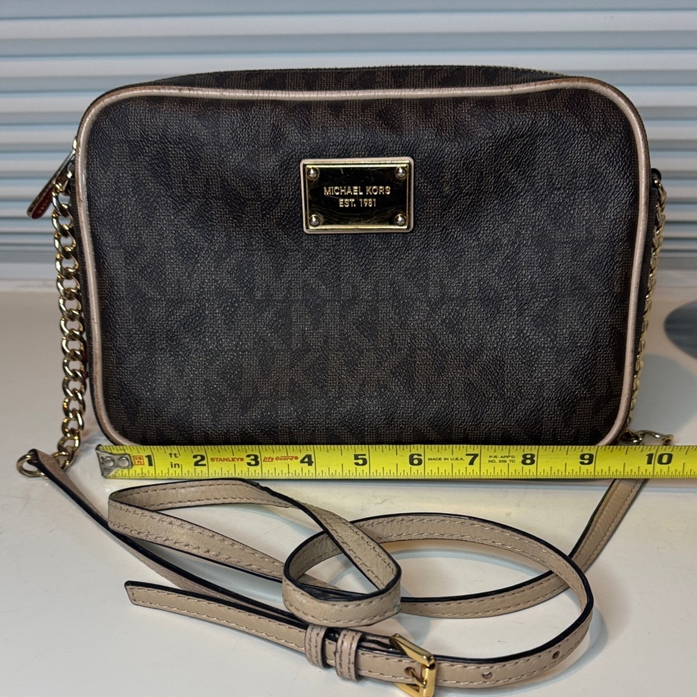 Michael Kors Dark Brown monogram Crossbody Bag with Gold Name plate